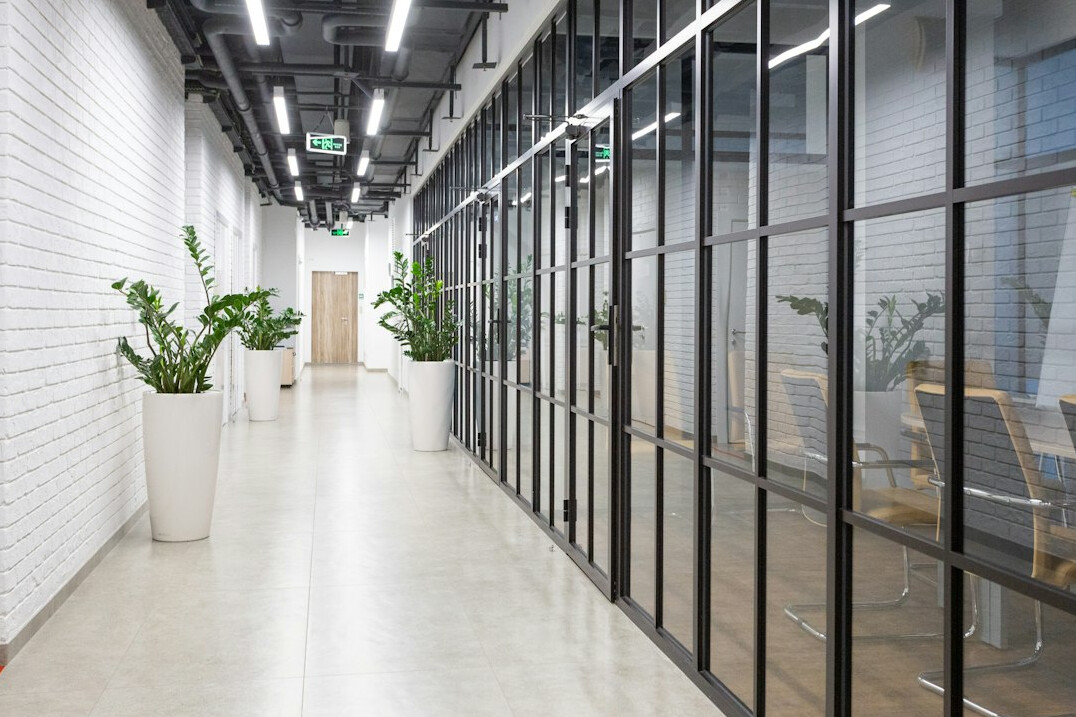 colleagues walking in office hallway