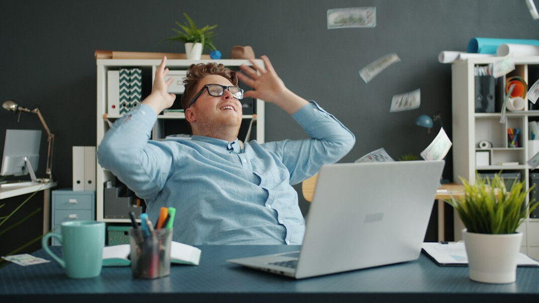 office worker stretching at desk
