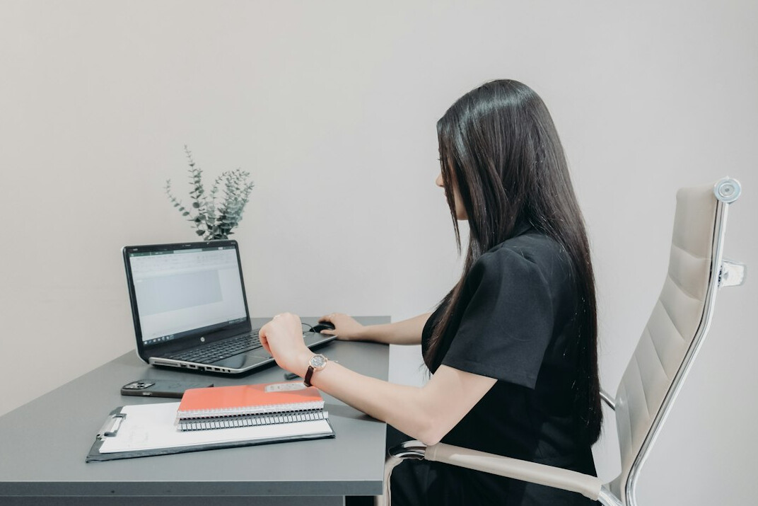 person doing yoga at workplace